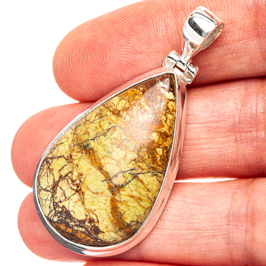 Teardrop gaspeite pendant in polished .925 sterling silver with yellow-brown stone