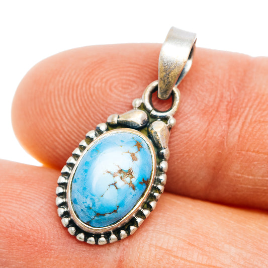 Sterling silver turquoise oval pendant with beaded bezel and loop bail