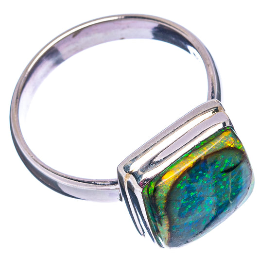 Sterling silver opal ring with oval green-blue opal, raised bezel on band, size 8