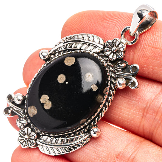 Oval obsidian galaxy pendant in .925 sterling silver with bezel and cross accents