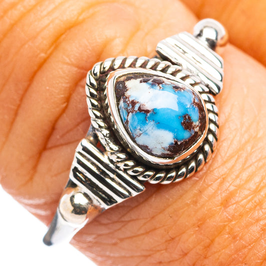 Sterling silver turquoise oval cabochon ring with ornate raised bezel