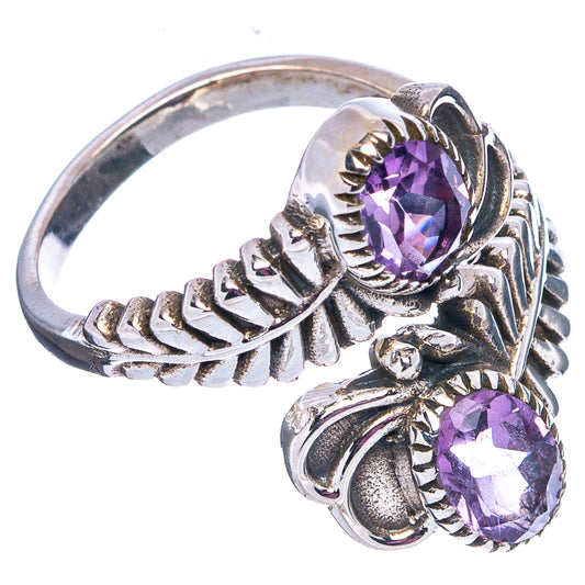 Sterling silver amethyst ring with oval faceted stones and decorative leaf-like settings