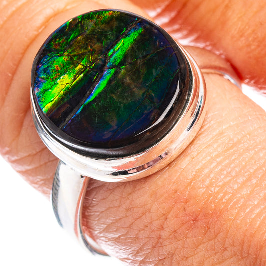 Sterling silver ammolite ring with round oval iridescent green-blue stone