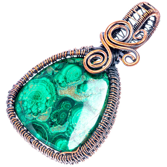 Wire-wrap malachite pendant with oxidized copper border and spiral accents, teardrop.