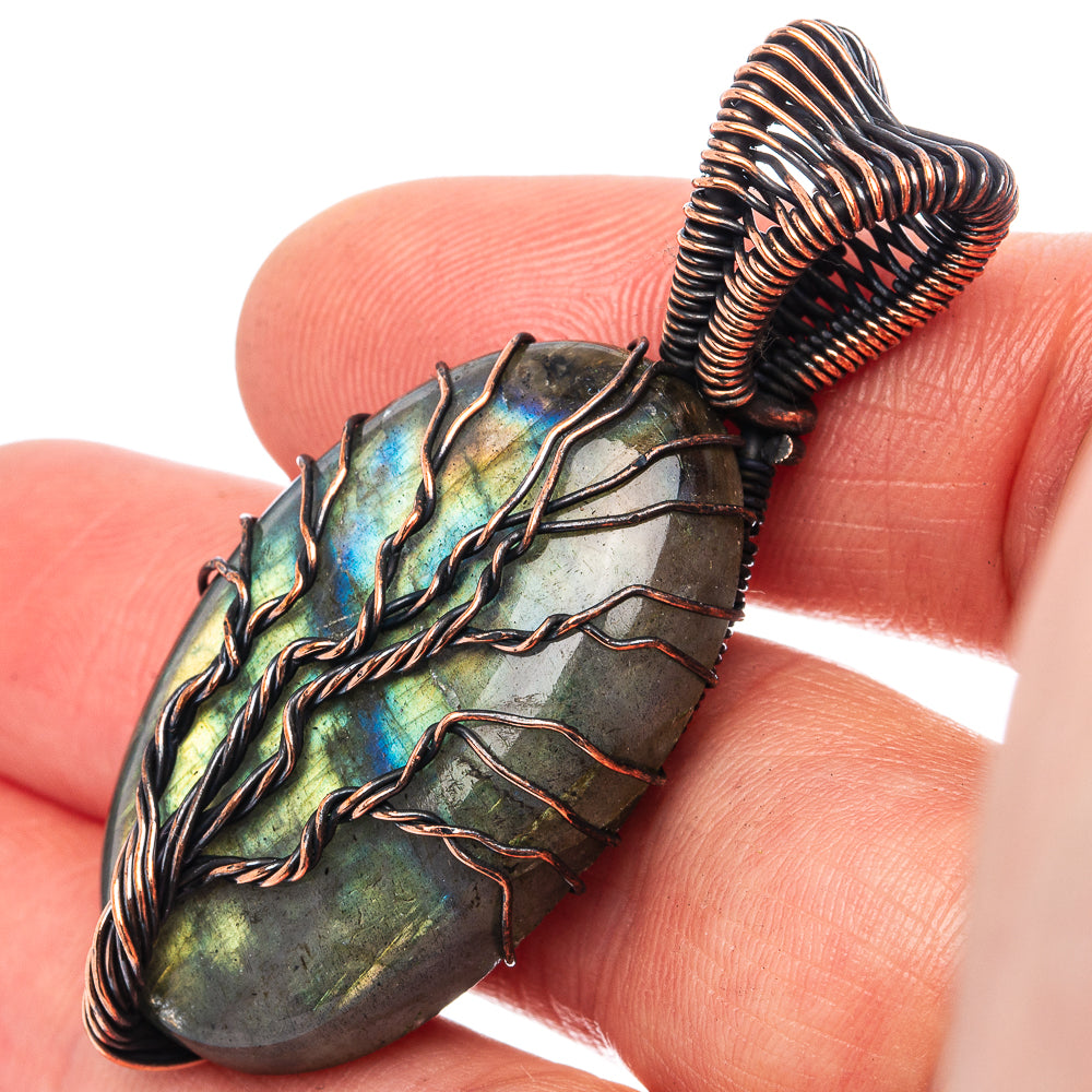 Oxidized copper labradorite pendant with tree-of-life wire wrap and iridescent stone