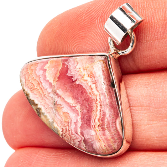 Pink rhodochrosite teardrop pendant in .925 sterling silver with silver bail