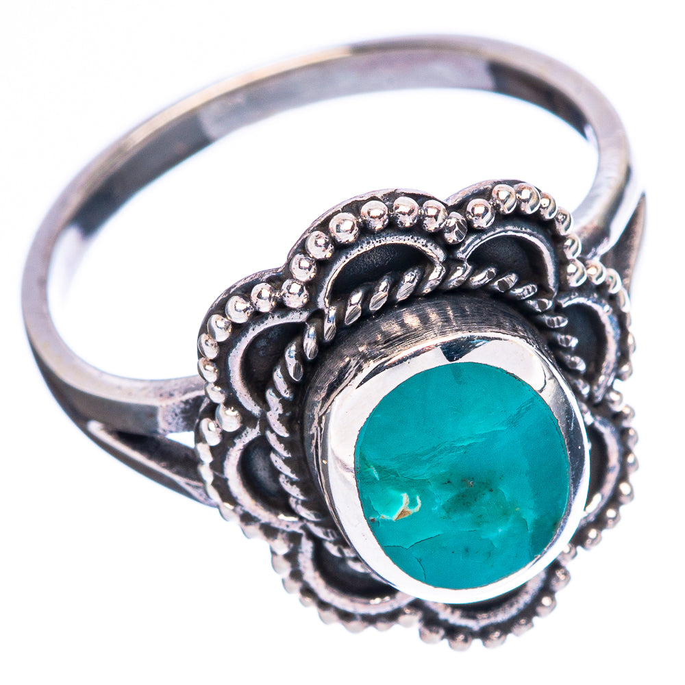 Oval turquoise cabochon sterling silver ring with detailed bead and filigree band