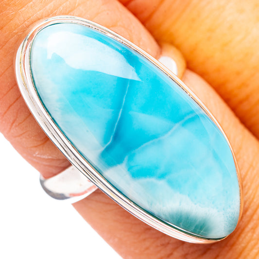 Larimar ring with oval blue stone in .925 sterling silver bezel
