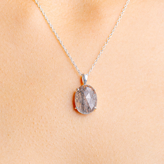 Sterling silver necklace with faceted tourmalinated quartz teardrop pendant
