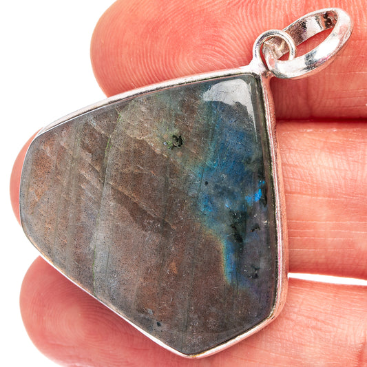 Labradorite pendant with silver-plated bezel and loop bail, dark gray-blue stone