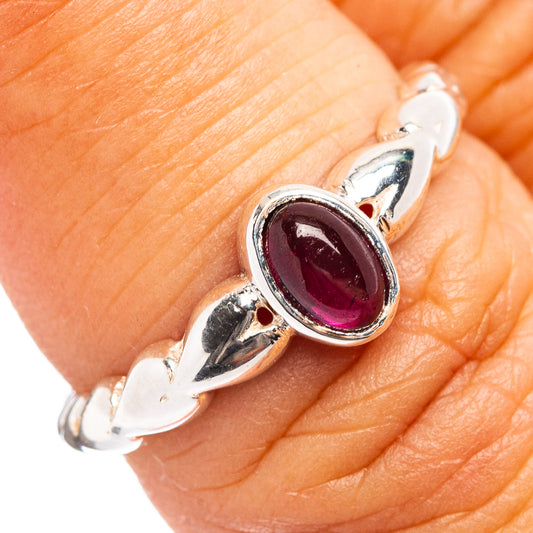 Sterling silver garnet ring with marquise oval ruby-red gemstone, split band detail