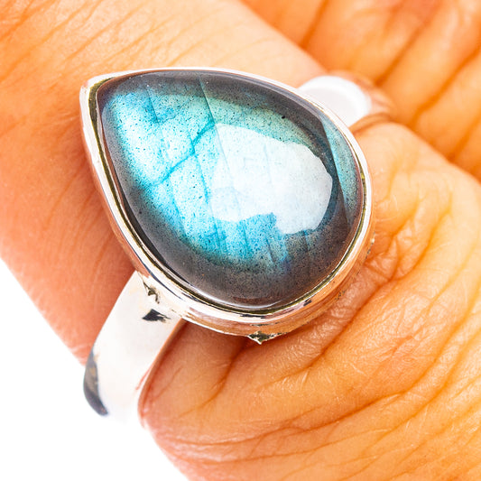 Sterling silver labradorite ring with teardrop gemstone showing blue flashes
