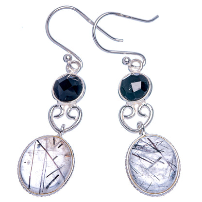 Sterling silver drop earrings with lever hooks, black onyx rounds and quartz ovals