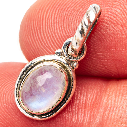 Sterling silver moonstone pendant with oval purple-pink cabochon and loop bail