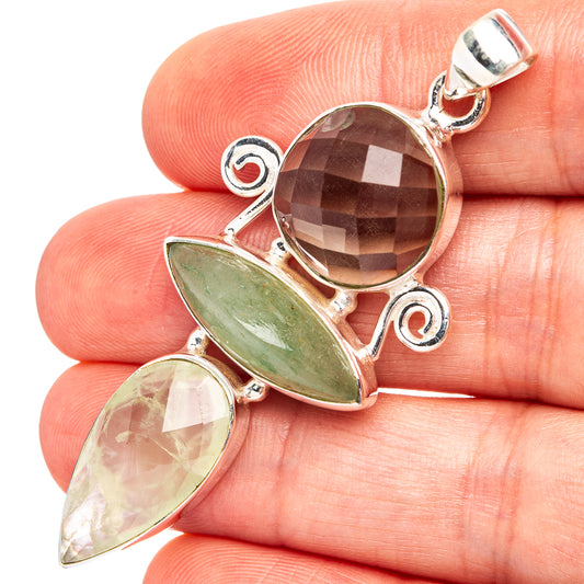 Sterling silver gemstone pendant with green oval and smoky round stones