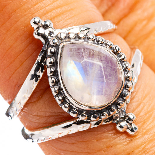 Sterling silver rainbow moonstone ring with pear-shaped stone and beaded frame