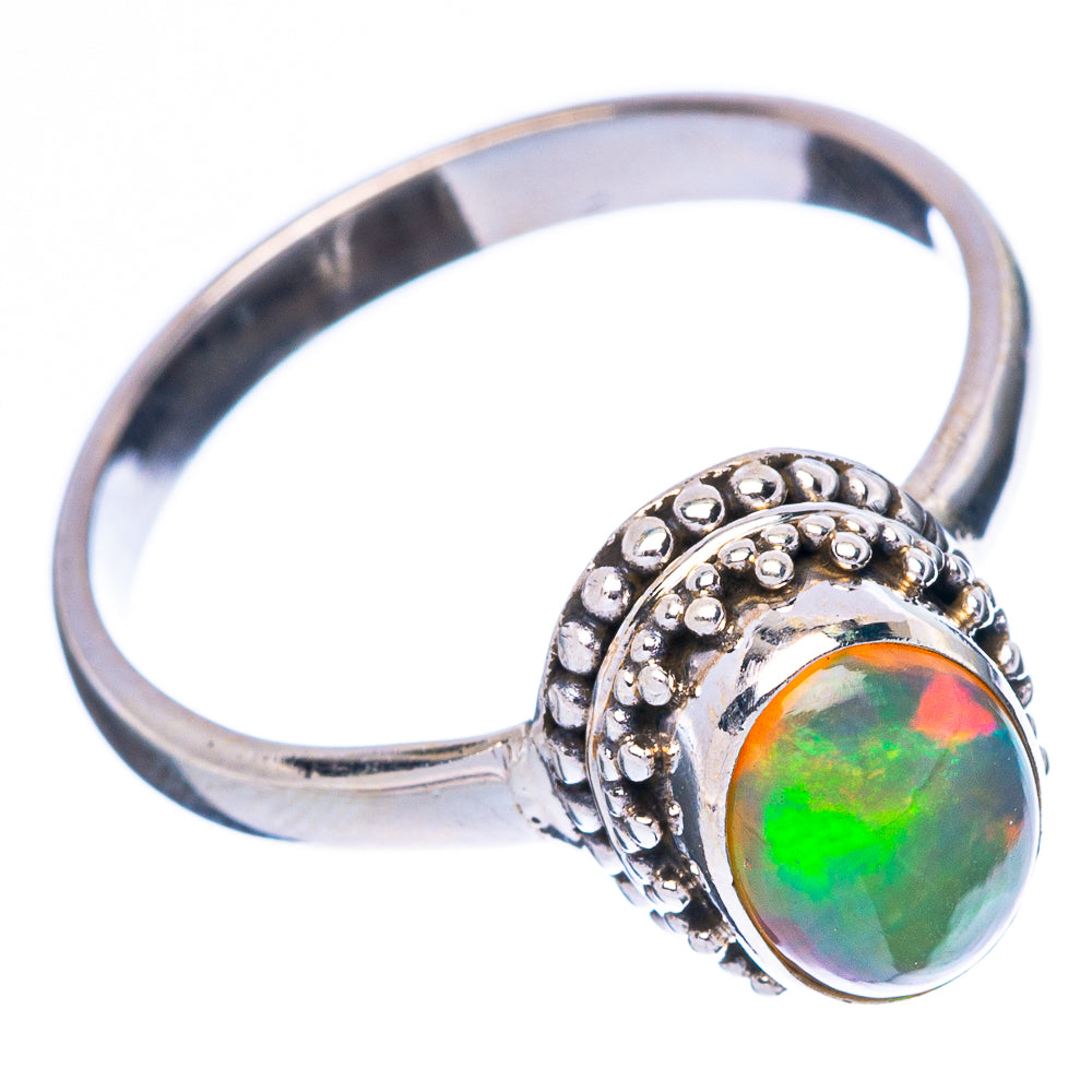 Sterling silver oval opal ring, side view; bezel with green multicolor cabochon