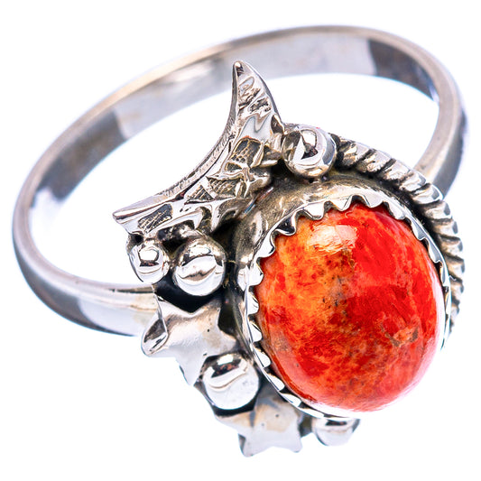 Sterling silver coral style ring with orange-red cabochon and engraved side star accents