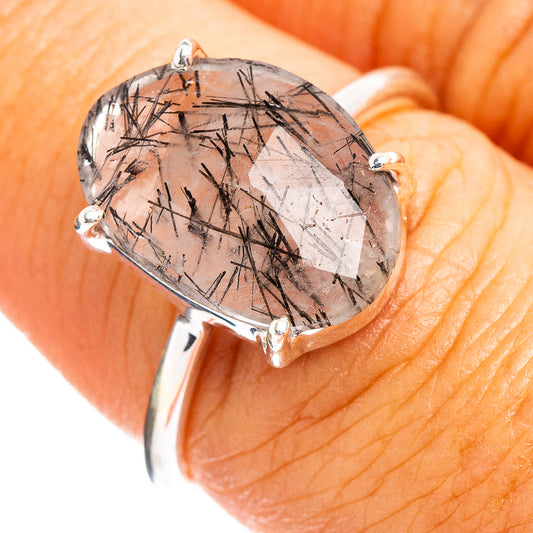 Sterling silver ring with faceted clear quartz and black tourmaline inclusions