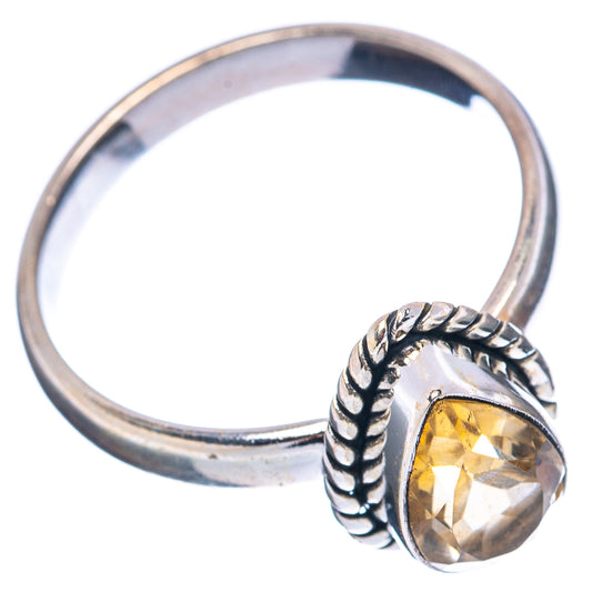 Sterling silver citrine ring close-up of oval yellow gem and rope-textured top