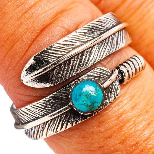 Turquoise cabochon feather ring, .925 silver adjustable band shown on finger
