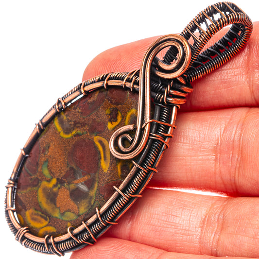 Oxidized copper wire-wrapped oval jasper pendant with loop bail detail