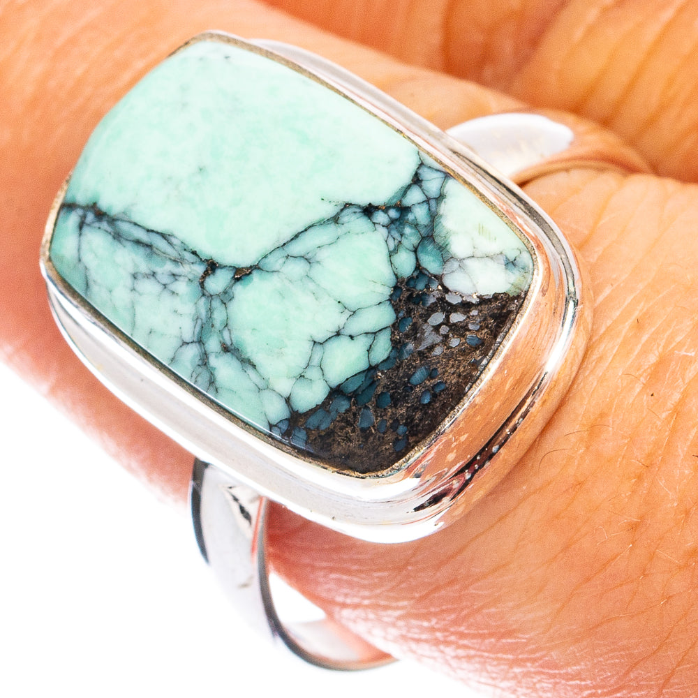 Sterling silver ring with oval turquoise variscite gemstone and black matrix detail