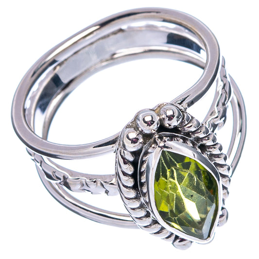 Sterling silver peridot ring side view, oval green stone with decorative prong work