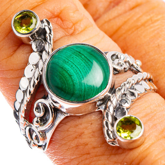 Sterling silver oval malachite ring with yellow peridot side stones, ornate openwork