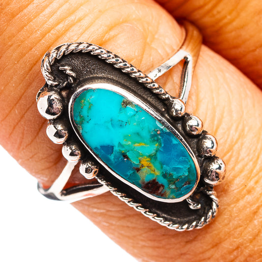 Turquoise oval stone ring in .925 sterling silver, dark bezel with bead and rope detailing