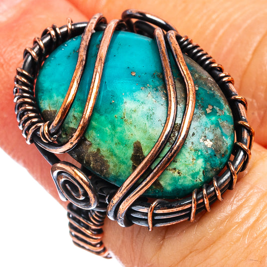 Turquoise cabochon wire wrap ring with oxidized copper accents