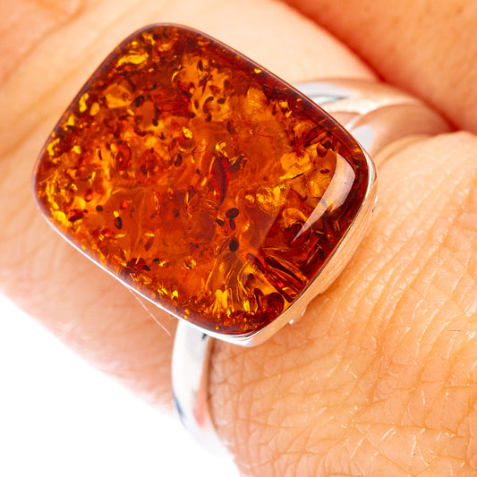 Amber resin square stone bezel on a silver adjustable ring