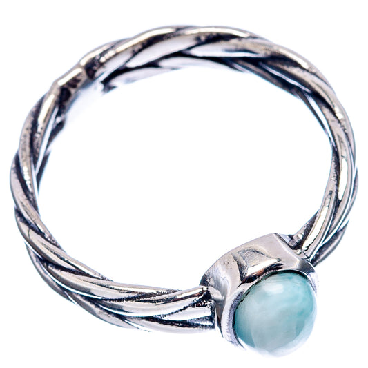 Sterling silver dainty ring with oval light-blue larimar cabochon centerpiece