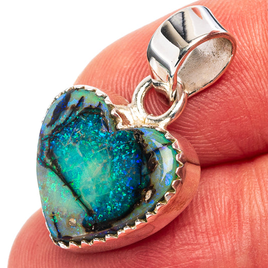 Sterling silver bezeled opal heart pendant with hinged bail