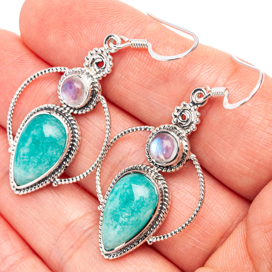 Sterling silver drop earrings with turquoise amazonite and iridescent moonstone teardrops