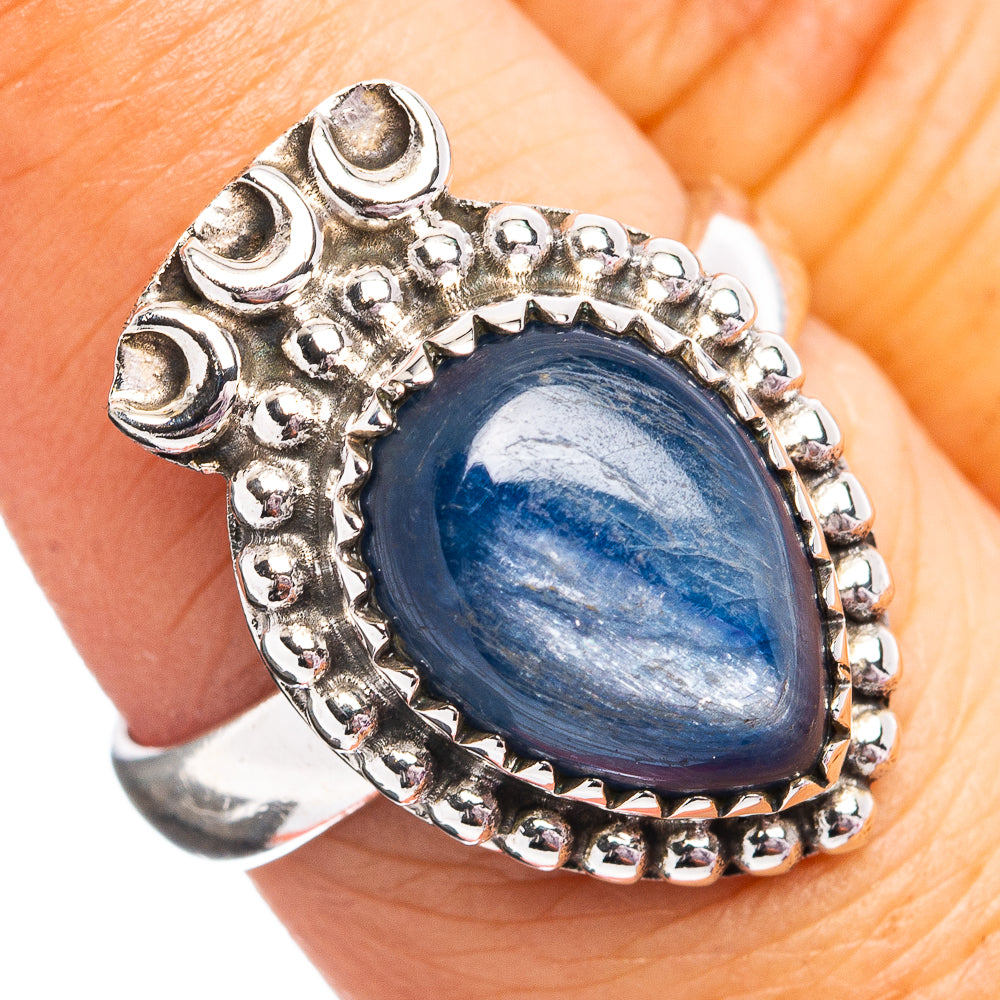 Sterling silver kyanite ring with oval blue cabochon and detailed bezel setting