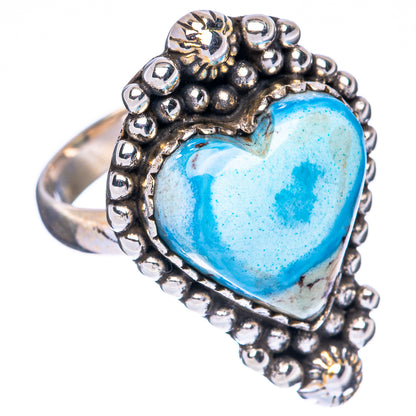 Turquoise heart ring with raised gemstone and silver beaded border, size 6.75