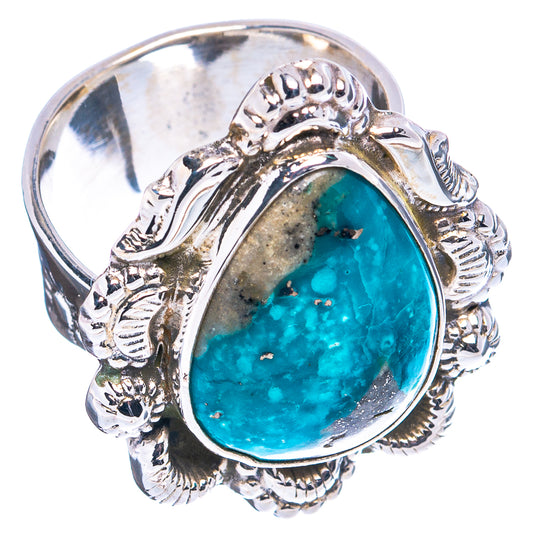 Oval turquoise cabochon silver ring with detailed scroll and rope band