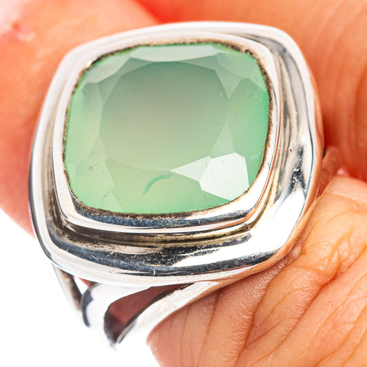 Sterling silver ring with faceted aqua chalcedony oval cabochon, close-up top view