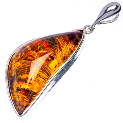 Sterling silver teardrop pendant with large amber stone and loop bail