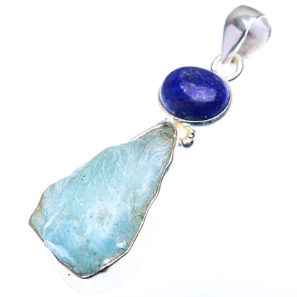 Sterling silver pendant with blue lapis round stone and light aquamarine raw slice