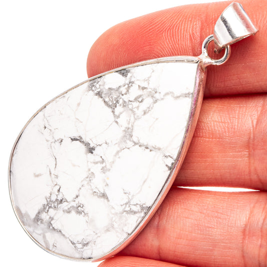 Silver-plated teardrop howlite pendant with white marbled stone and loop bail