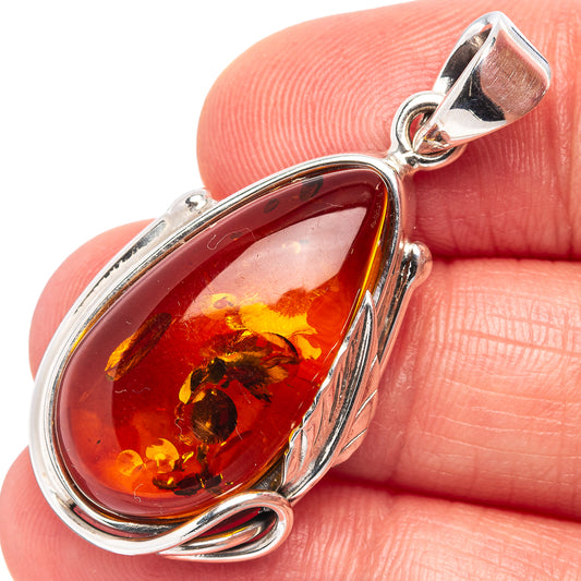 Amber teardrop leaf pendant in .925 sterling silver with amber resin and bail loop