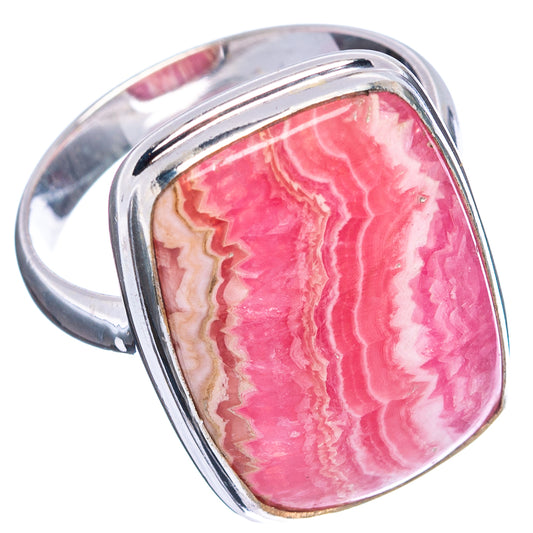 Sterling silver rhodochrosite ring with polished pink stone and raised bezel, side view