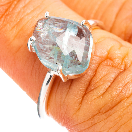 Faceted aquamarine ring with oval stone set in .925 sterling silver prongs