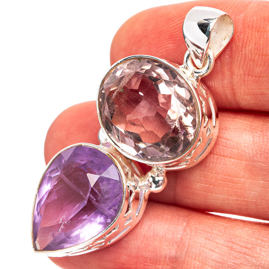 Sterling silver pendant with two faceted oval amethyst gemstones in a halo setting