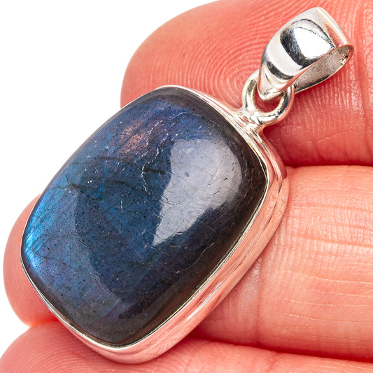 Sterling silver labradorite pendant with blue-gray oval gemstone bezel