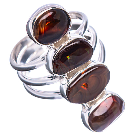 Sterling silver fire opal ring showing four oval bezel stones with dark brown and orange flashes.