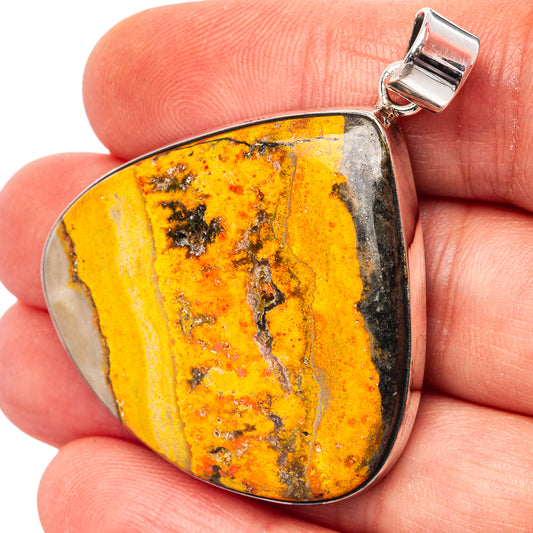 Sterling silver bumblebee jasper teardrop pendant with orange-yellow stone and loop bail