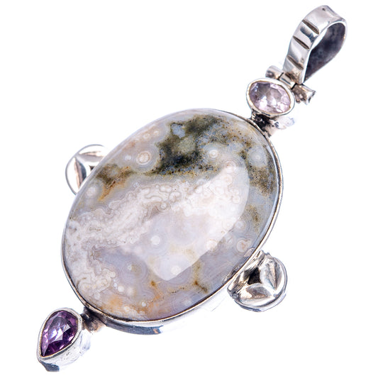 Sterling silver ocean jasper oval pendant with amethyst side stones and bail
